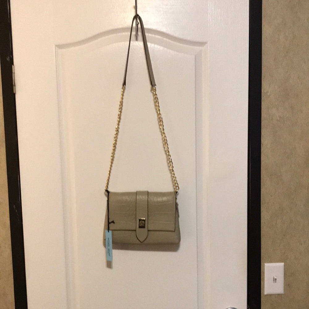Antonio melani  turn lock flap purse